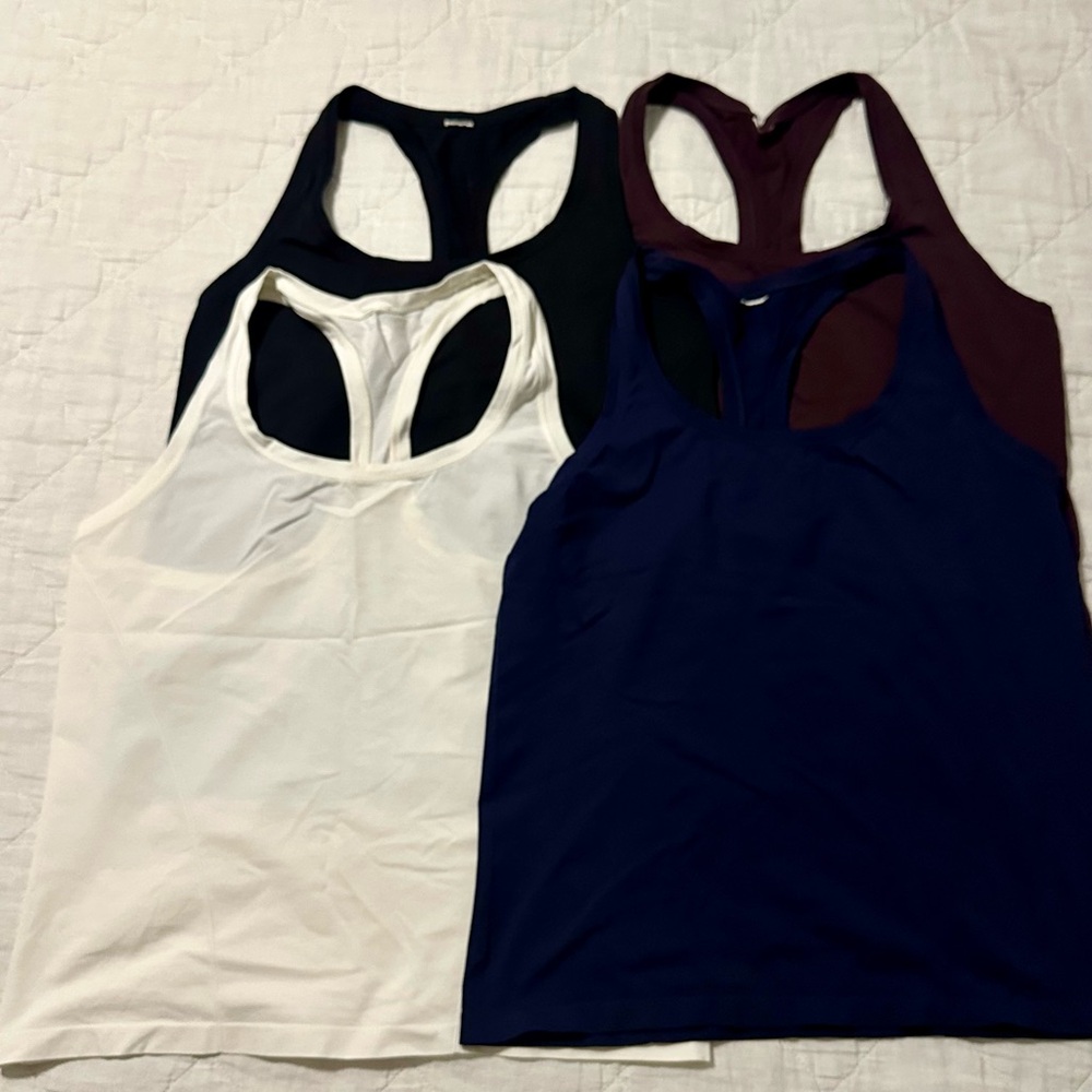 Lot of Four Fabletics Feather Tech+ Racerback Tank Large